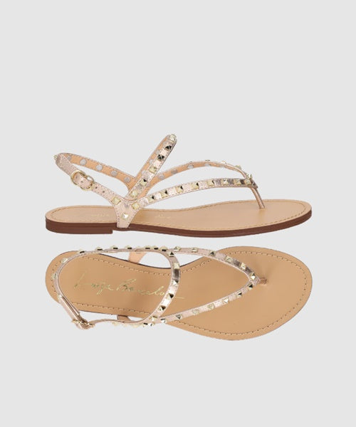 Sandália Rasteira em Couro Metalizado Rosa com Spikes